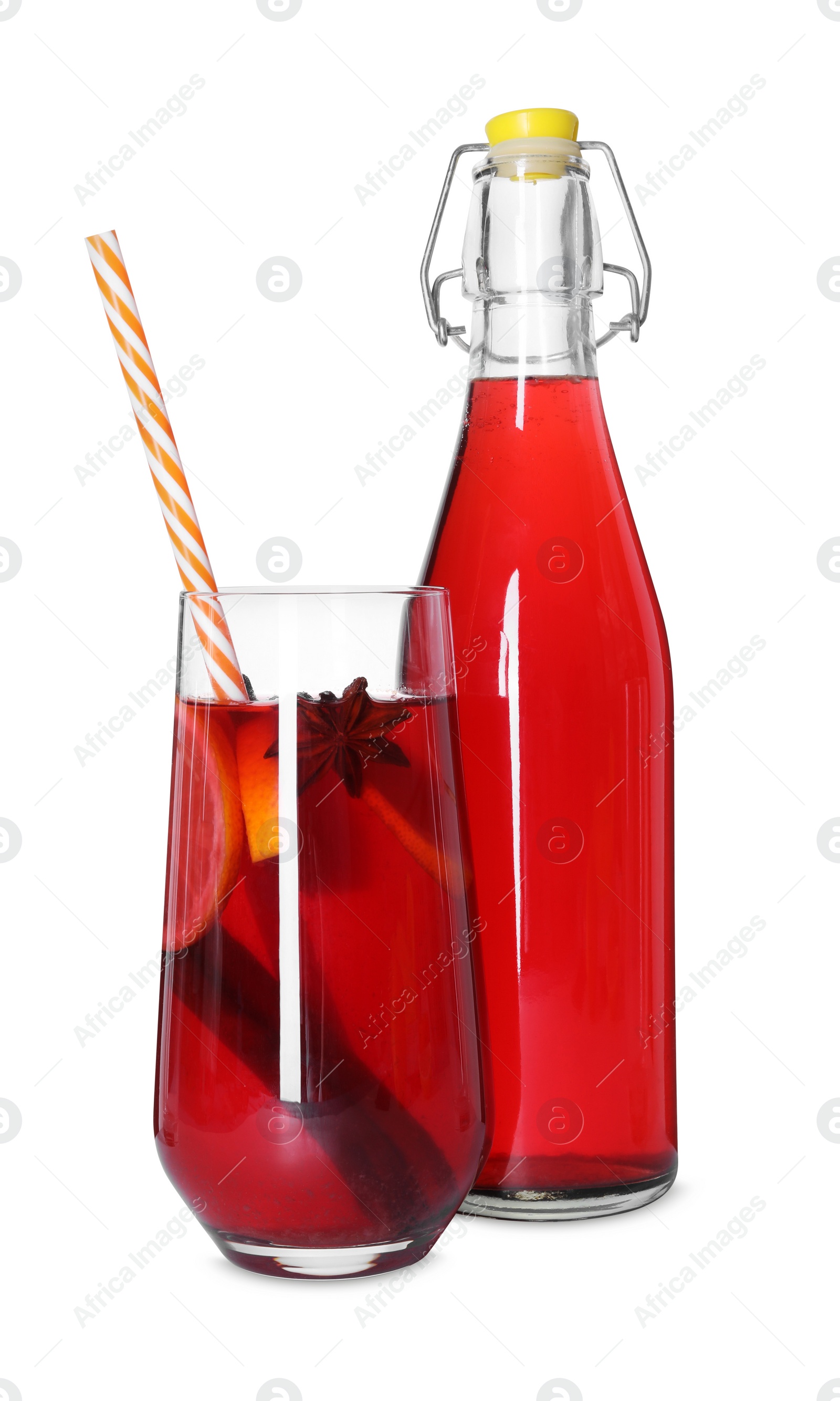 Photo of Bottle and glass with tasty punch drink isolated on white