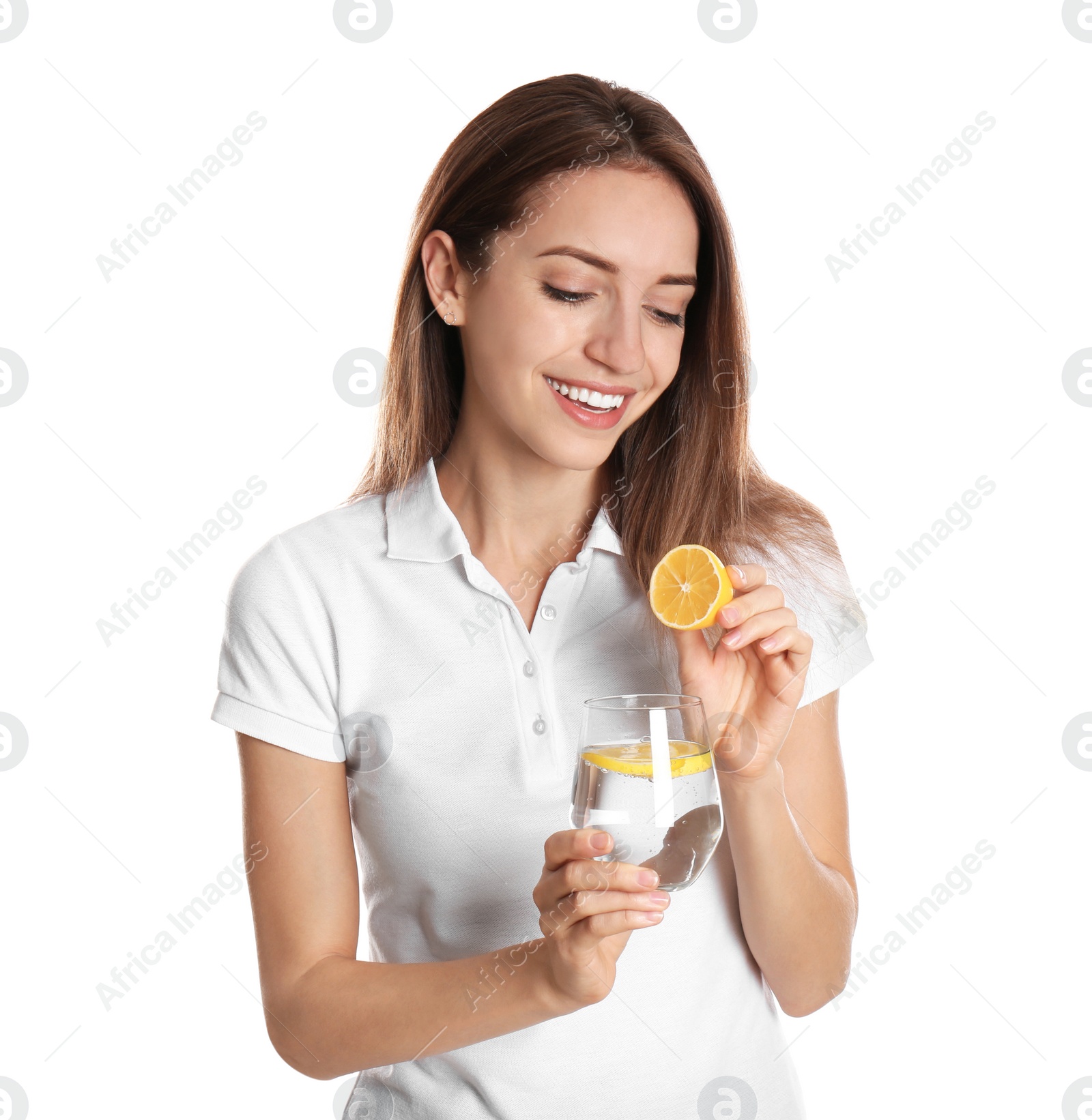 Photo of Young woman with glass of lemon water on white background