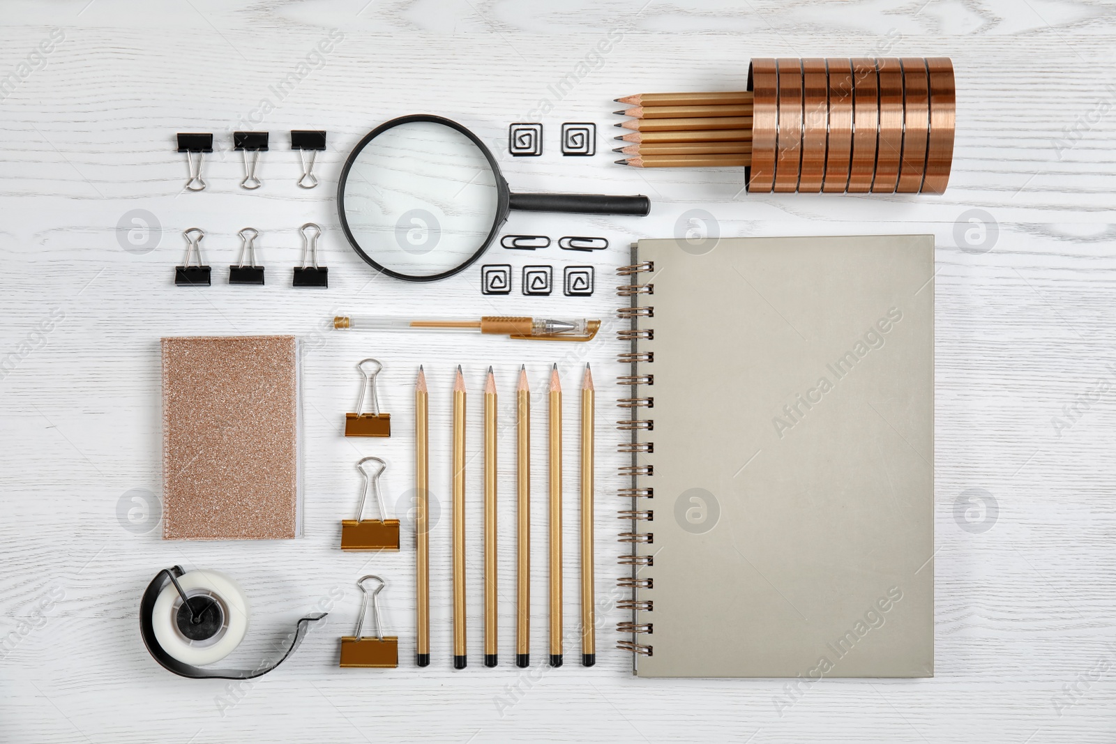 Photo of Different school stationery on wooden background, flat lay