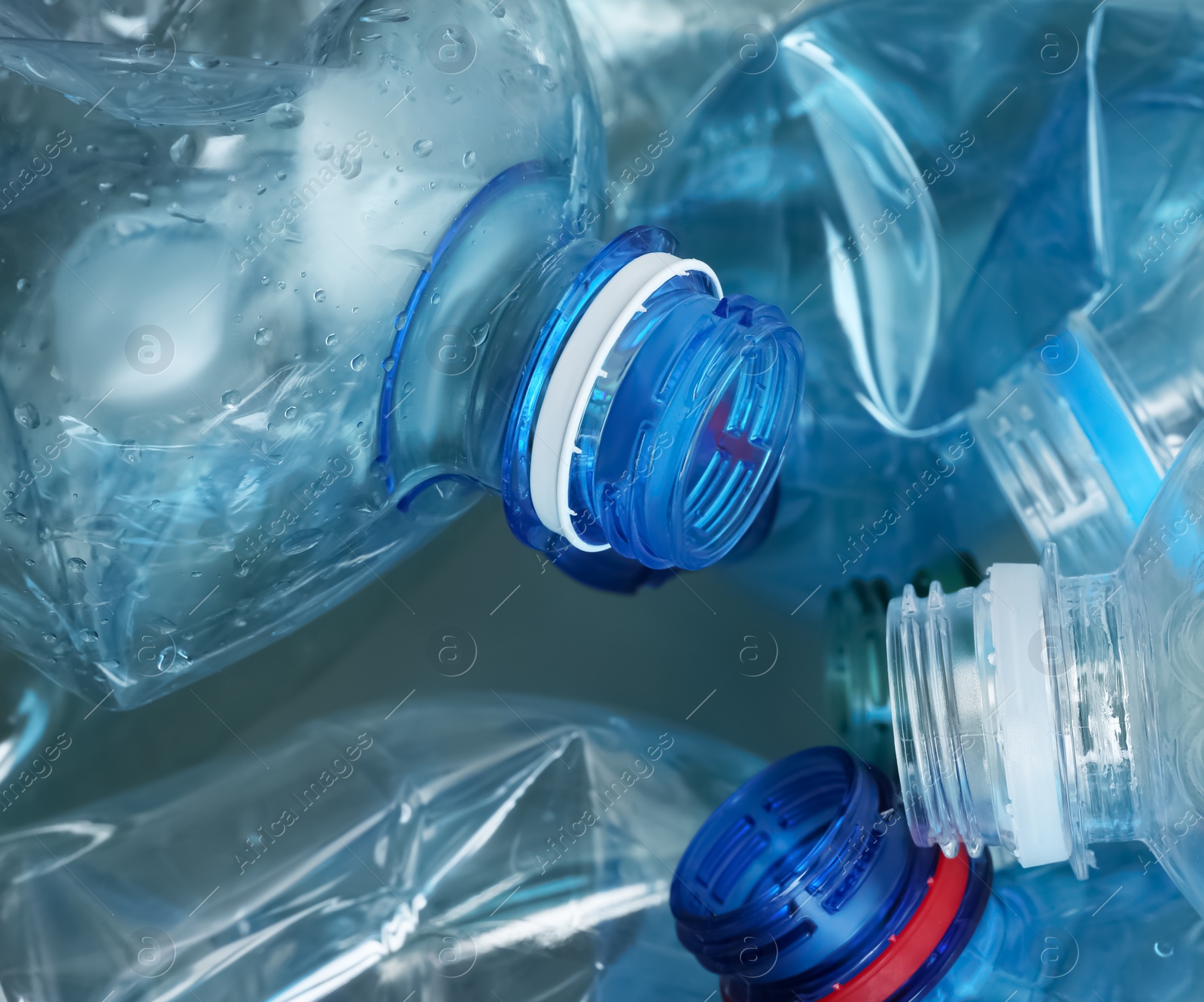 Photo of Many plastic bottles as background, closeup. Recycle concept