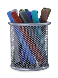 Photo of Many colorful markers in holder on white background