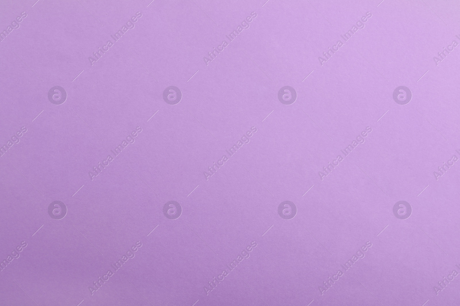 Photo of Abstract violet background, top view. Colorful paper