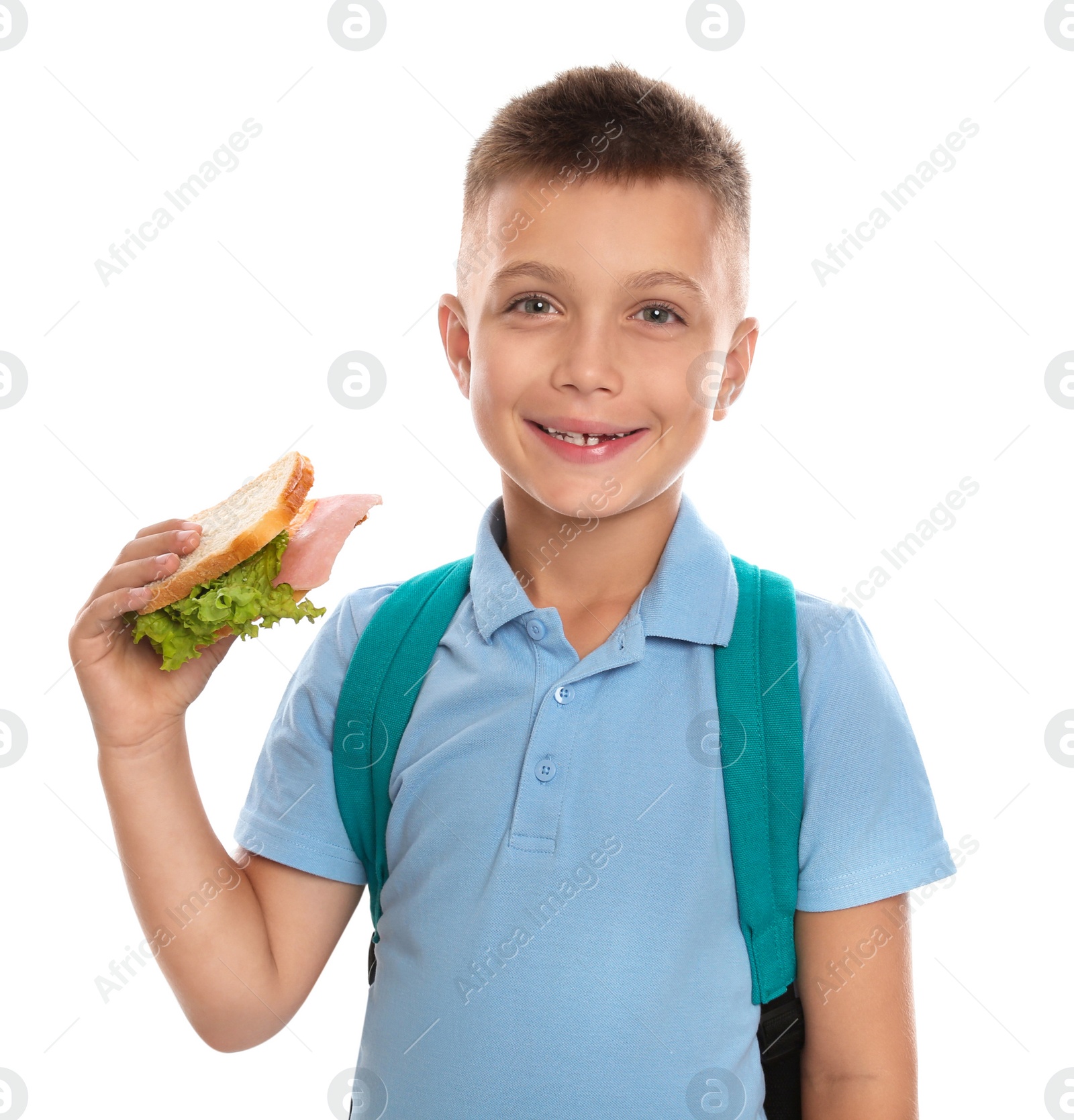 Photo of Happy boy holding sandwich on white background. Healthy food for school lunch