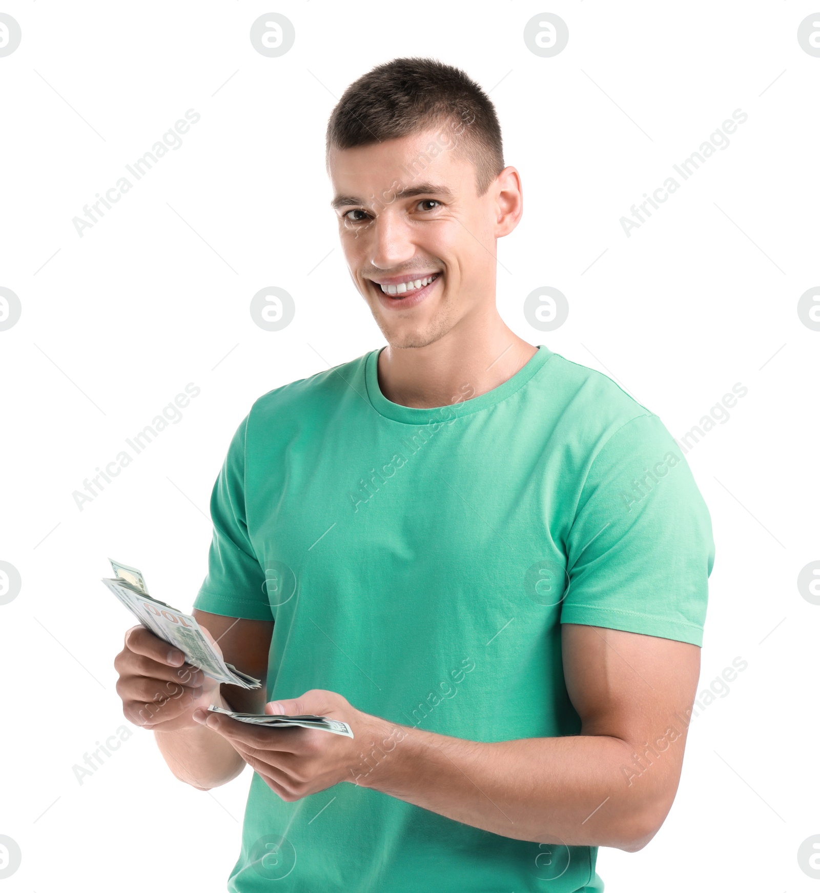 Photo of Handsome young man counting money on white background