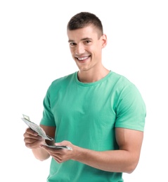 Photo of Handsome young man counting money on white background