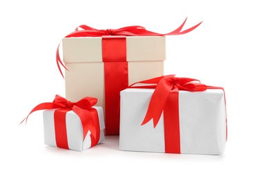 Beautifully decorated gift boxes on white background