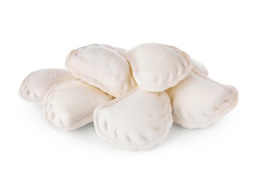 Photo of Pile of raw delicious dumplings (varenyky) on white background