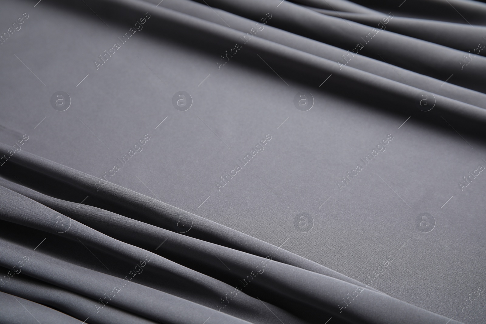 Photo of Texture of delicate black silk as background, closeup