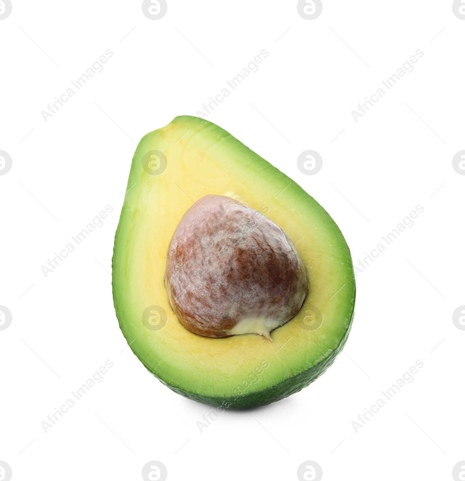 Photo of Half of ripe avocado with pit on white background