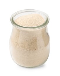 Granulated yeast in glass jar isolated on white