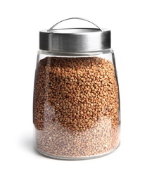 Jar with uncooked buckwheat on white background