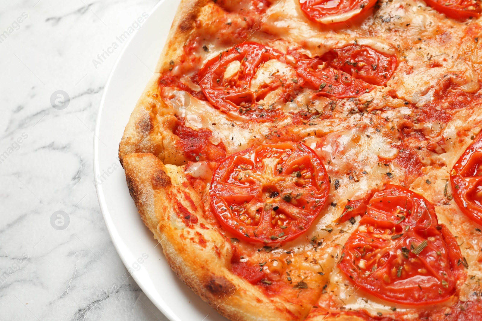 Photo of Hot cheese pizza Margherita on marble table, closeup