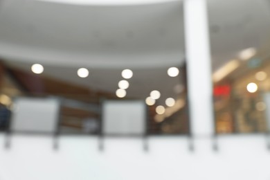 Photo of Blurred view of shopping mall interior. Bokeh effect