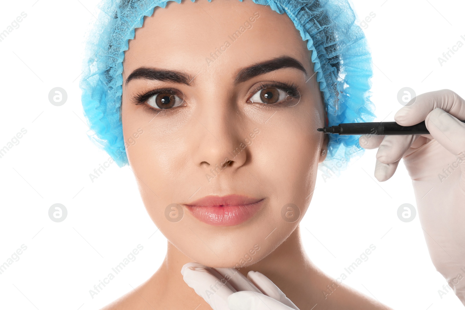 Photo of Doctor holding marker near young woman's face isolated on white, closeup. Plastic surgery concept