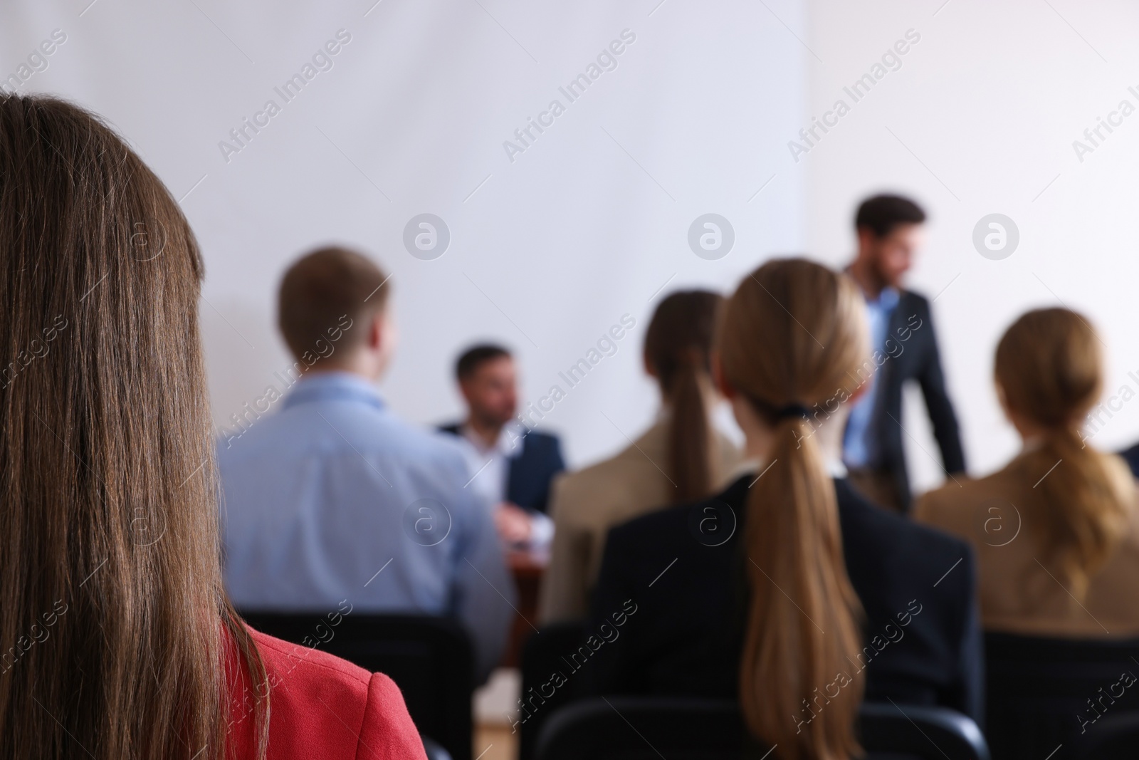Photo of People having business training in conference room, selective focus