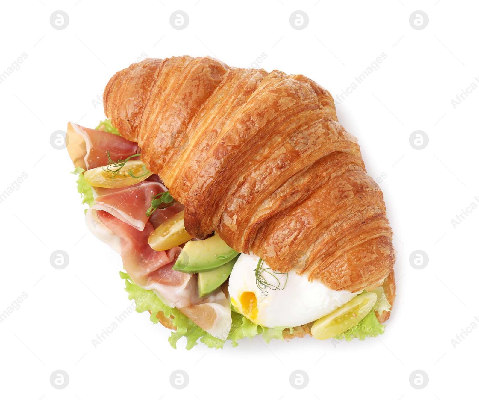 Photo of Delicious croissant with prosciutto, avocado and egg isolated on white, top view