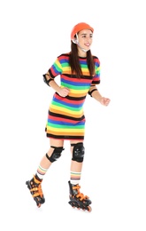 Photo of Young woman in bright dress with inline roller skates on white background