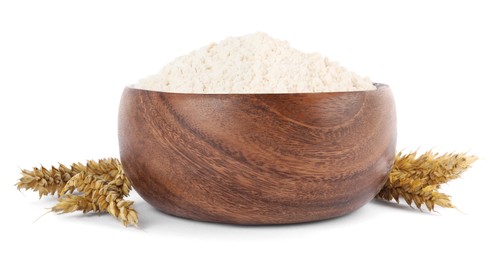 Wooden bowl of organic wheat flour isolated on white