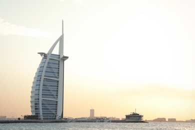 DUBAI, UNITED ARAB EMIRATES - NOVEMBER 03, 2018: Beautiful view of famous Burj Al Arab and amazing sunset sky