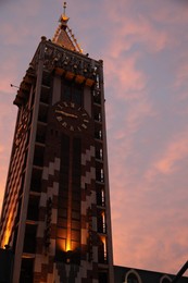 Photo of BATUMI, GEORGIA - MAY 31, 2022: Beautiful Piazza Boutique Hotel against colorful twilight sky