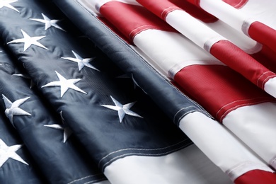 Photo of Folded American flag as background, closeup