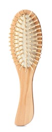 Photo of Bamboo hairbrush isolated on white. Conscious consumption