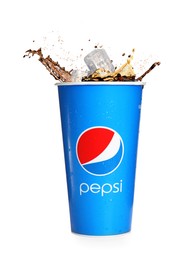 Image of MYKOLAIV, UKRAINE - JUNE 9, 2021: Pepsi splashing out of paper cup isolated on white