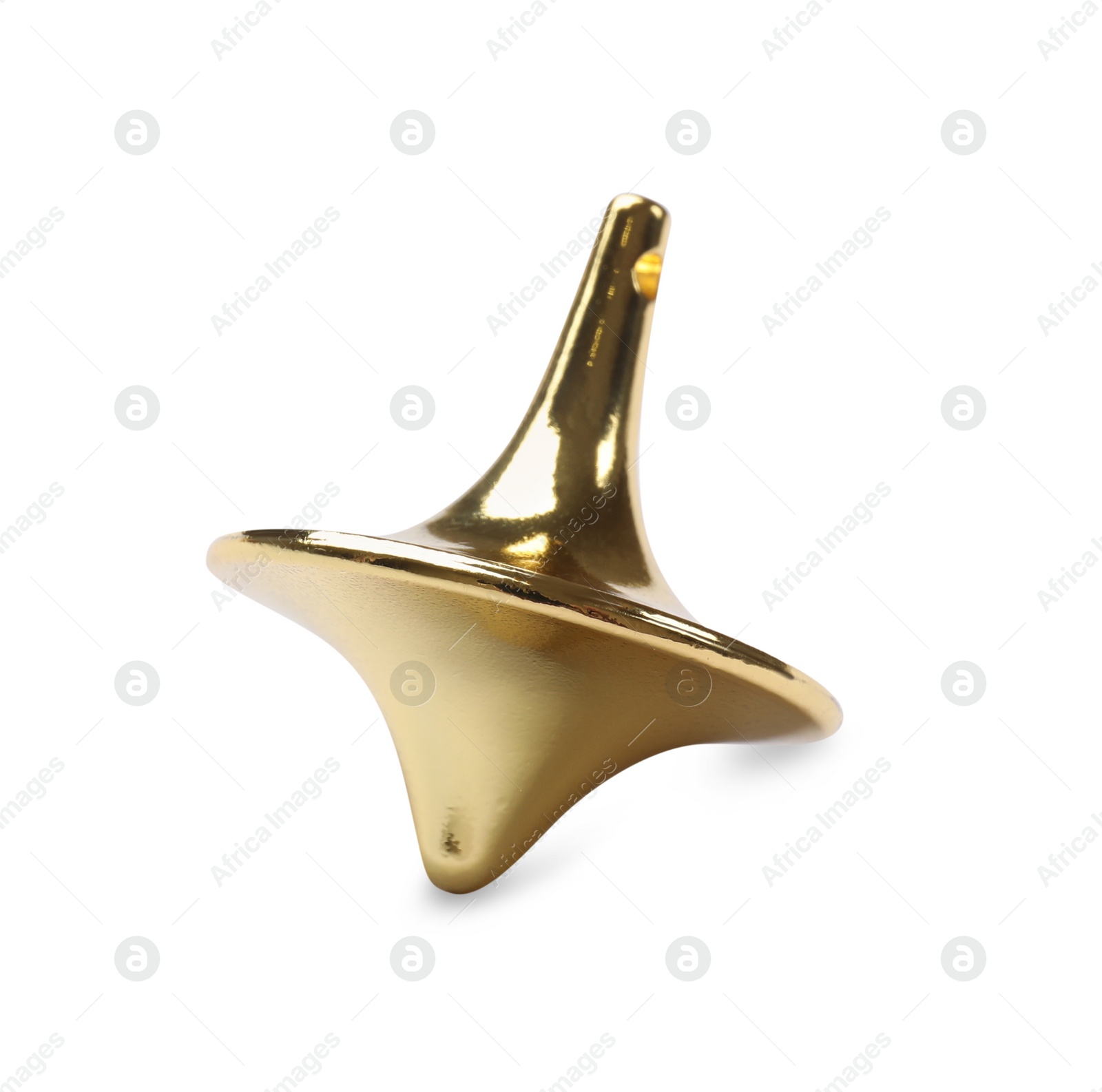 Photo of One golden spinning top on white background