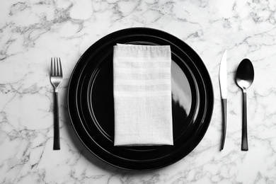 Photo of Elegant table setting on white marble background, flat lay