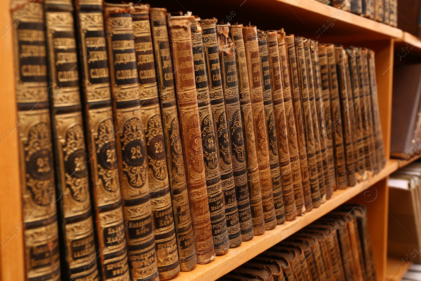 Photo of Collection of old books on shelf in library