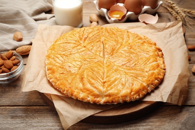 Traditional galette des rois on wooden table