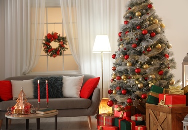 Photo of Beautiful living room interior with decorated Christmas tree