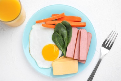 Flat lay composition with egg and cheese on white table. Breakfast for kids