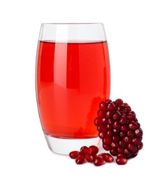 Photo of Refreshing pomegranate juice in glass and seeds isolated on white