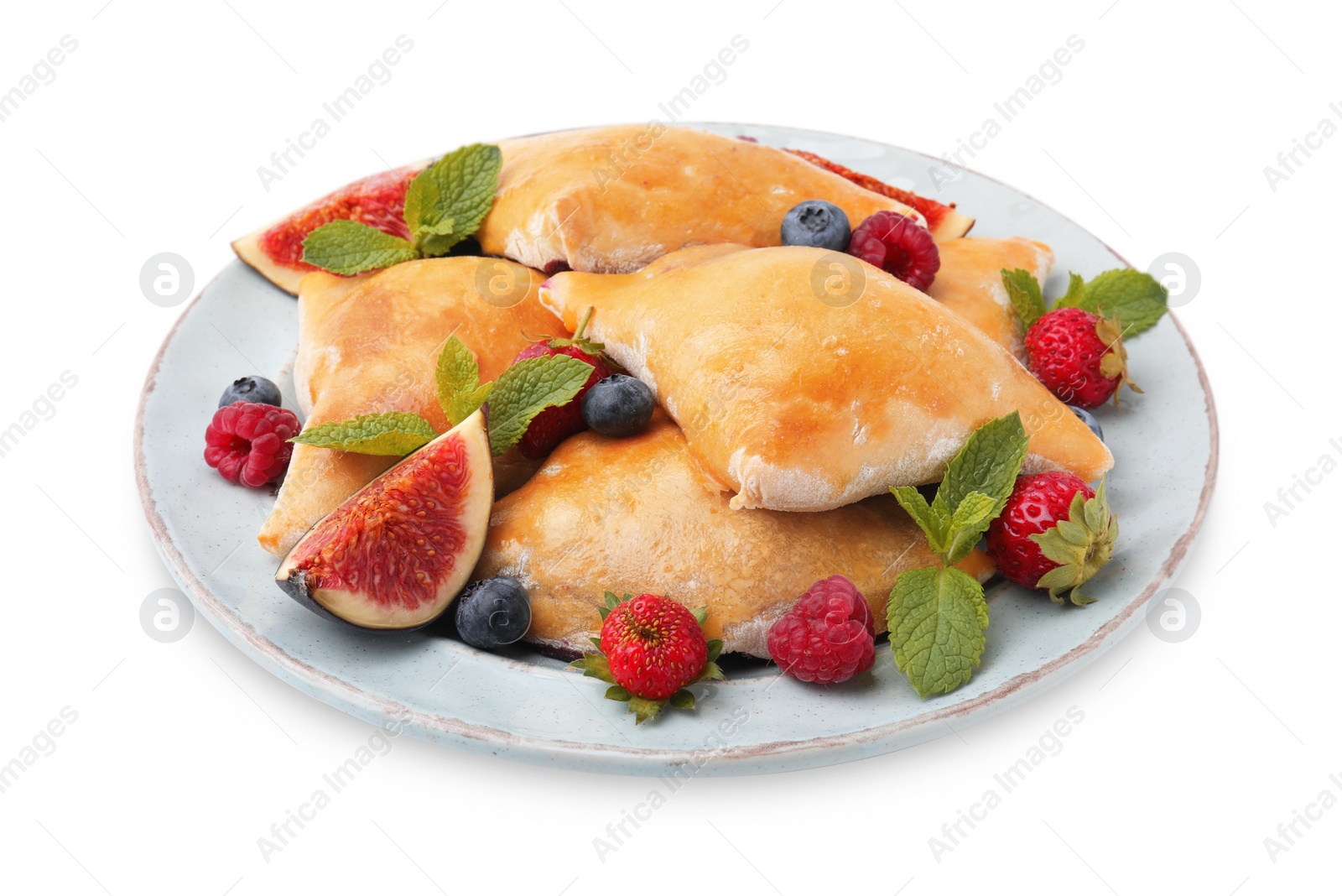 Photo of Delicious samosas with figs and berries isolated on white