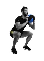 Athletic man doing squats with medicine ball isolated on white