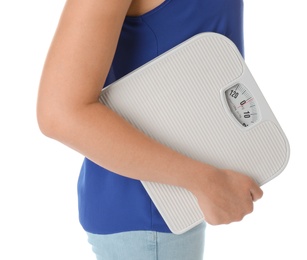 Woman holding scales on white background. Healthy diet