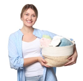 Photo of Happy woman with basket full of laundry on white background