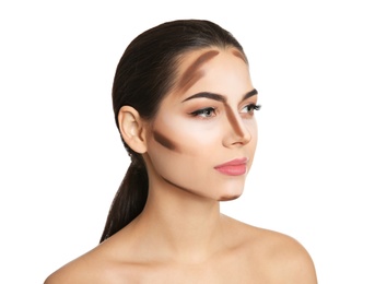 Photo of Young woman with contouring lines on her face against white background. Professional makeup products