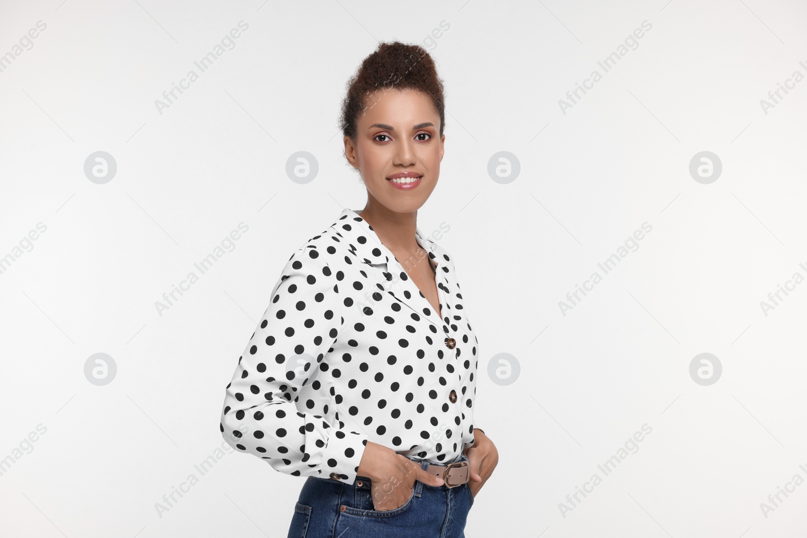 Photo of Portrait of beautiful young woman on white background