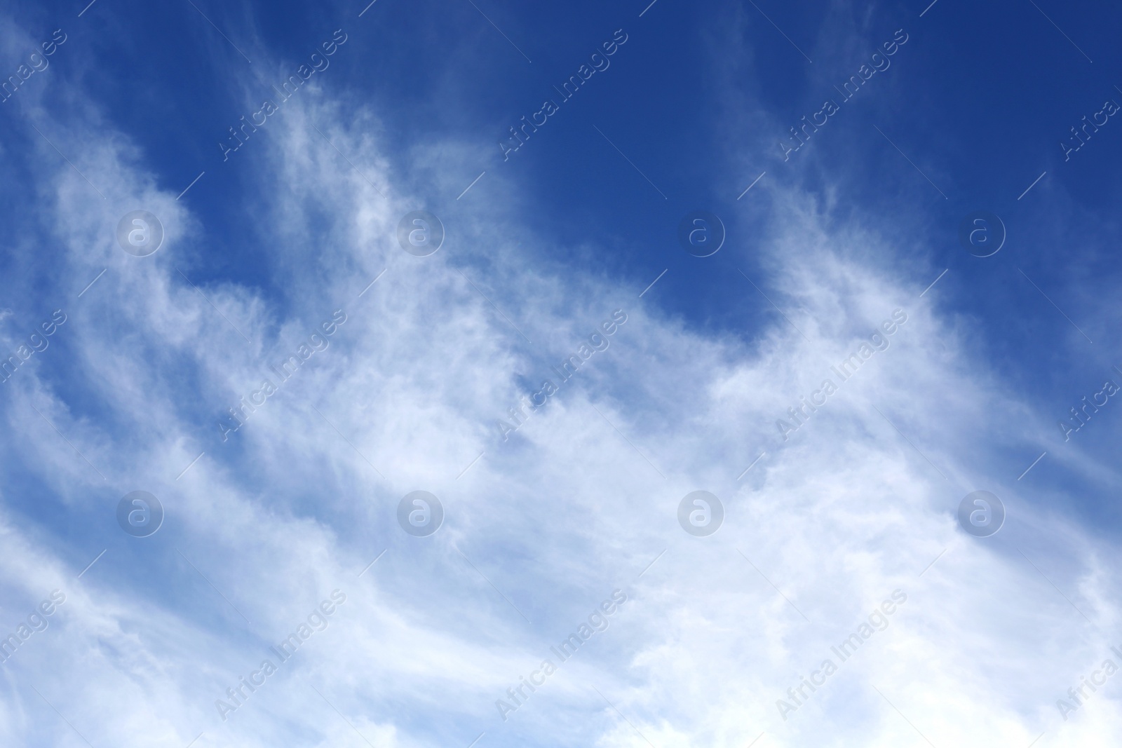 Photo of Picturesque blue sky with white clouds on sunny day