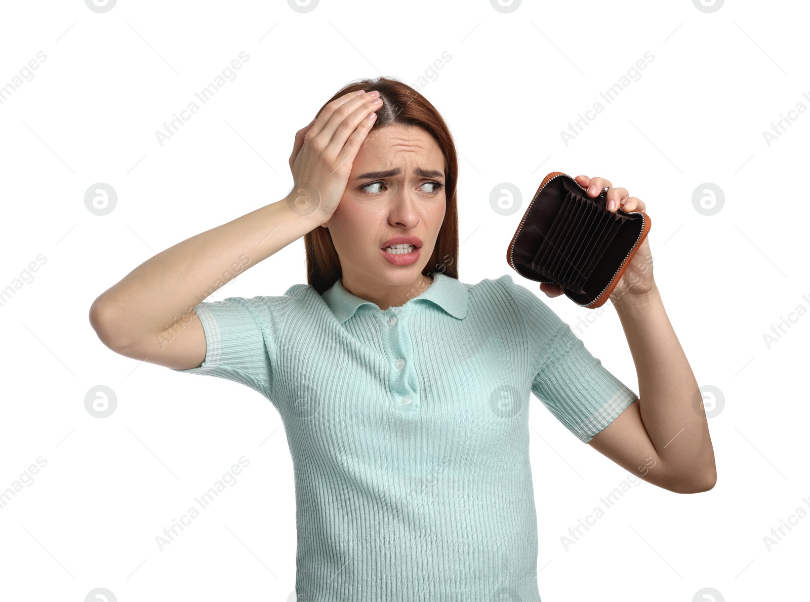 Photo of Confused woman with empty wallet on white background