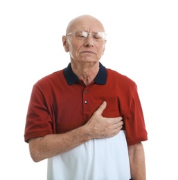 Elderly man suffering from pain in chest on white background