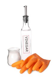 Eco friendly natural cleaners. Vinegar in bottle, gloves and jar of soda isolated on white