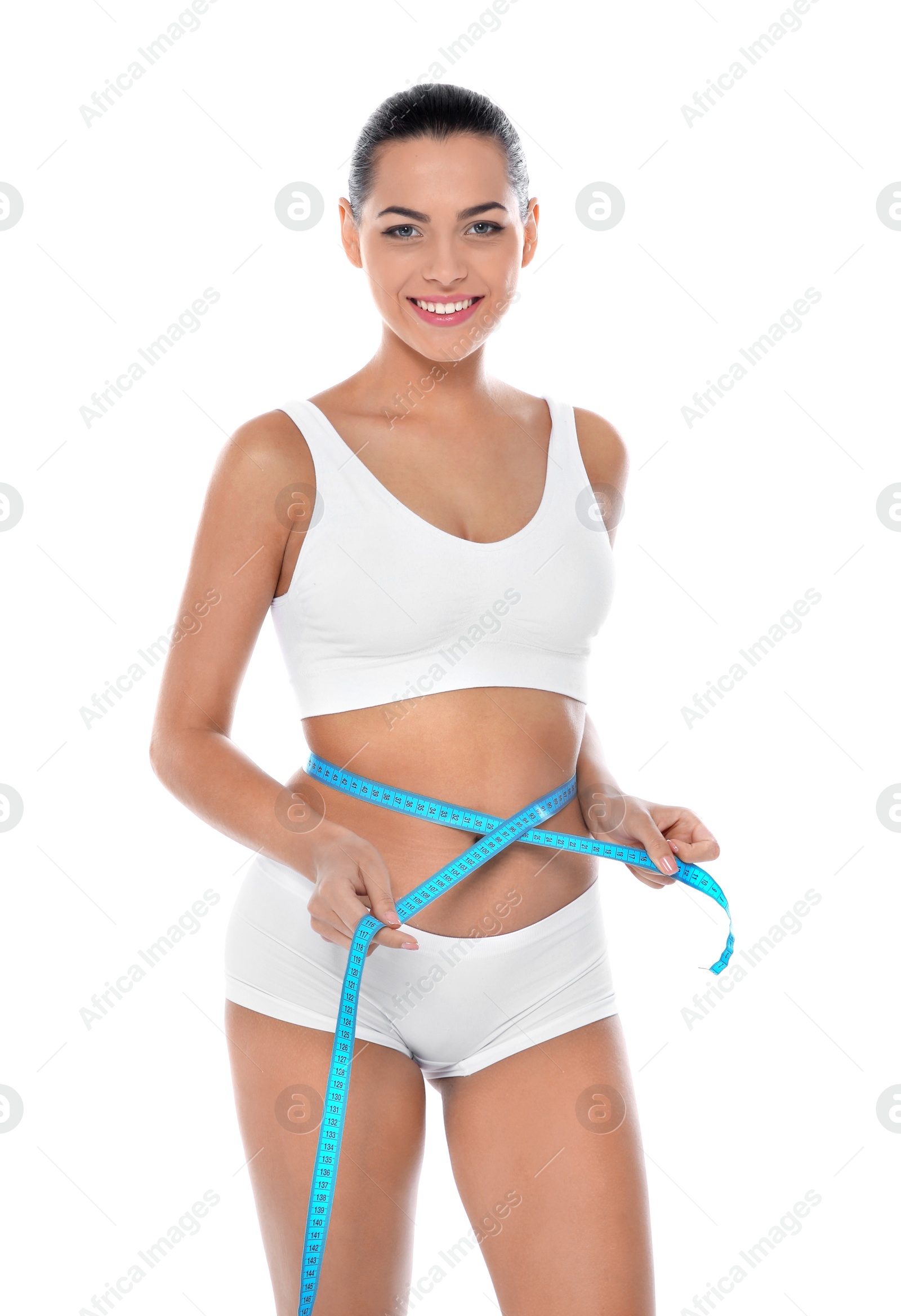 Photo of Slim woman measuring her waist on white background. Weight loss