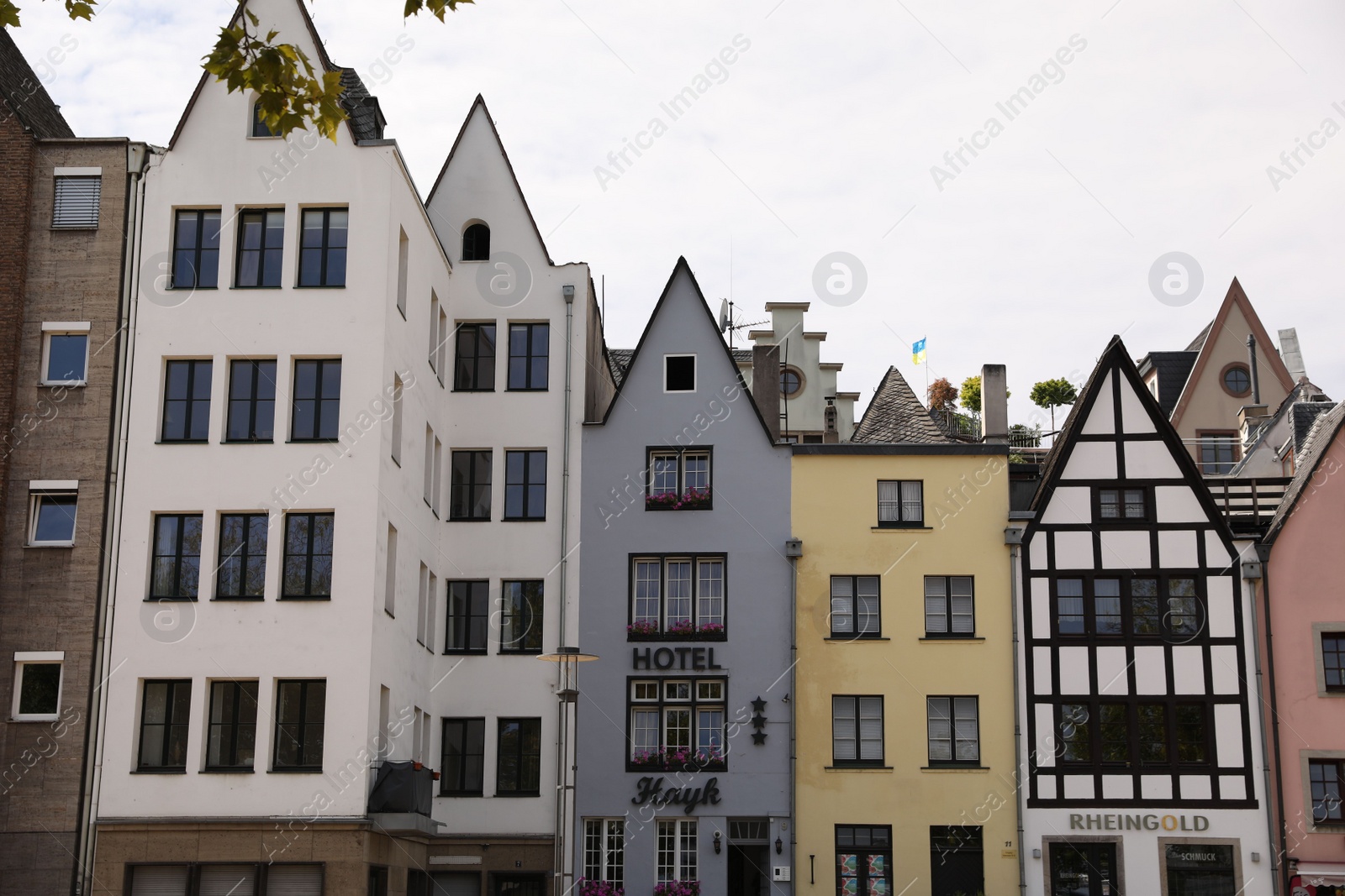 Photo of Cologne, Germany - August 28, 2022: Beautiful residential buildings on city street