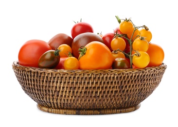 Fresh ripe tomatoes in wicker bowl on white background