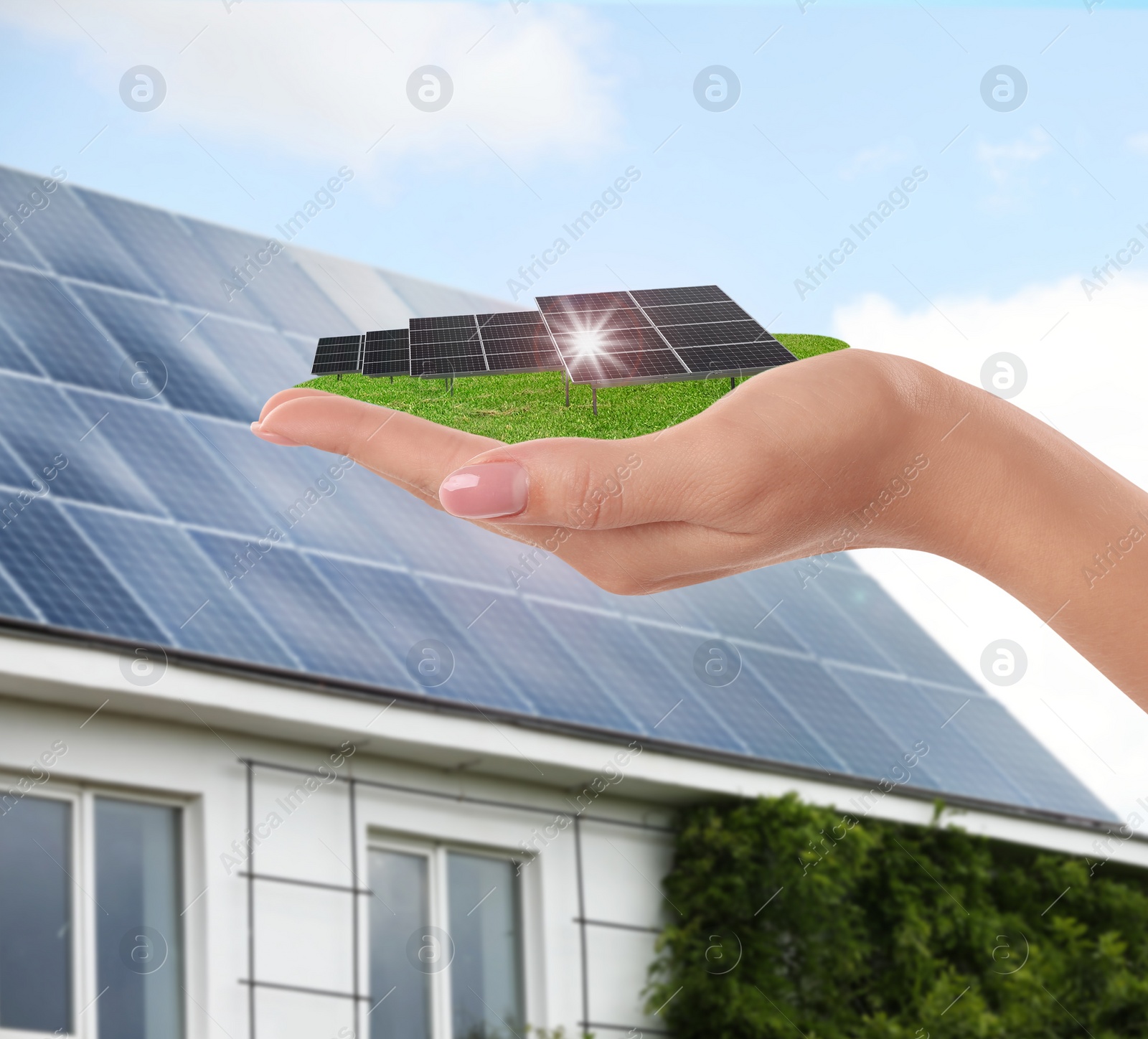 Image of Woman demonstrating solar panel outdoors, closeup. Alternative energy source 