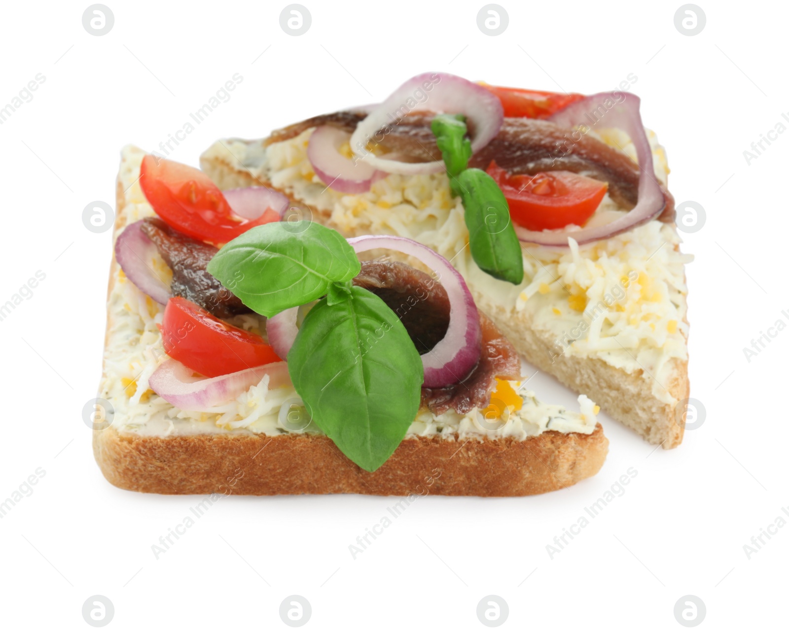 Photo of Delicious sandwiches with anchovy, tomato and basil on white background