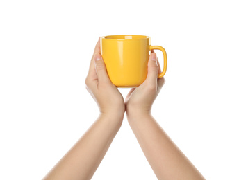 Photo of Woman holding yellow cup on white background, closeup